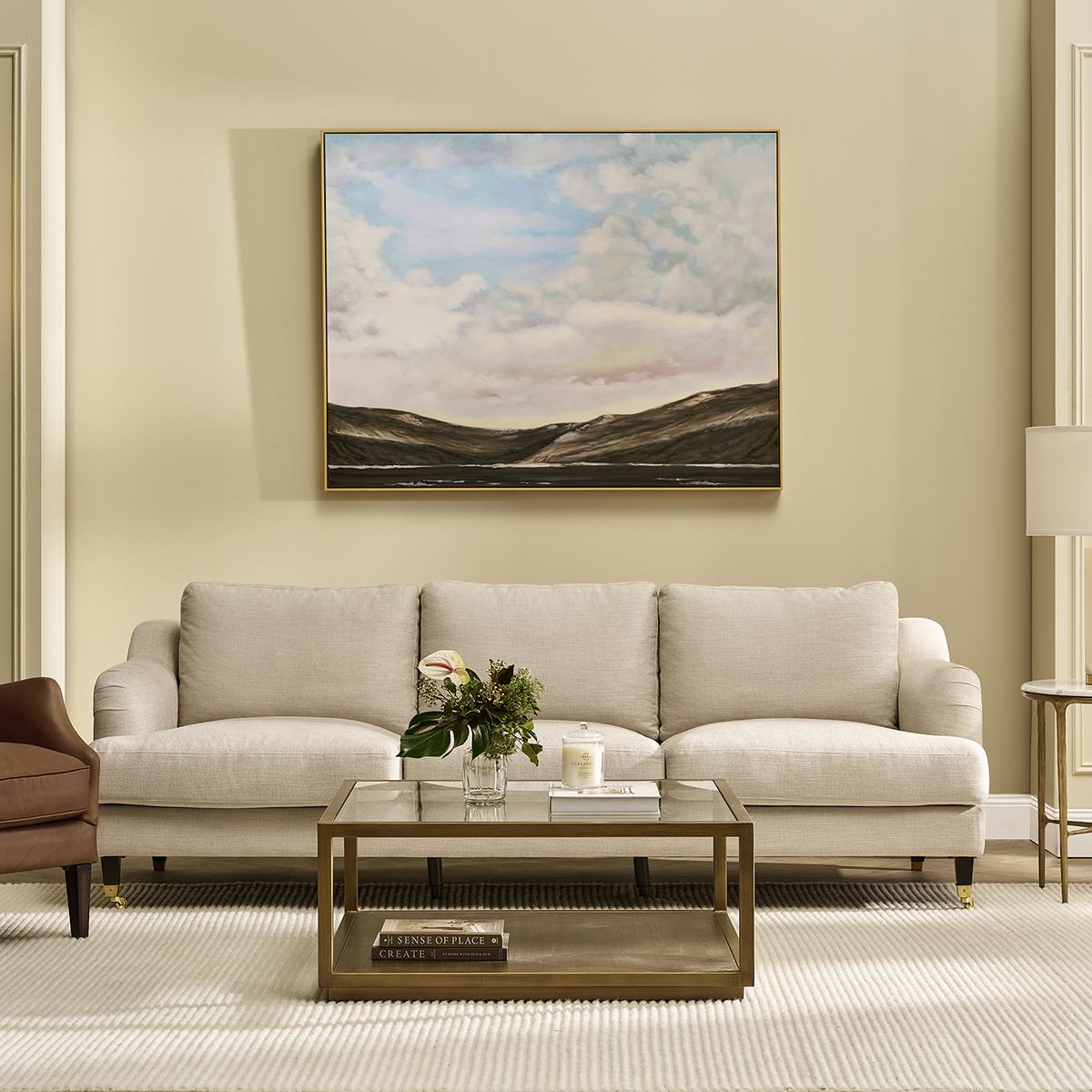 The Aerin sofa in Natural Linen in a styled living room